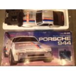 Boxed radio control Porsche 944. P&P Group 3 (£25+VAT for the first lot and £5+VAT for subsequent