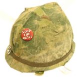 Vietnam War Era US M1 Helmet with Mitch Camo Cover. P&P Group 2 (£18+VAT for the first lot and £3+