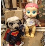 Superman Meerkat and a doll. Not available for in-house P&P, contact Paul O'Hea at Mailboxes on