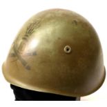 WWII Italian Alpine Artillery Helmet with battle damage. P&P Group 3 (£25+VAT for the first lot