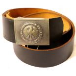 German inter-war period leather belt with pressed metal buckle. P&P Group 1 (£14+VAT for the first