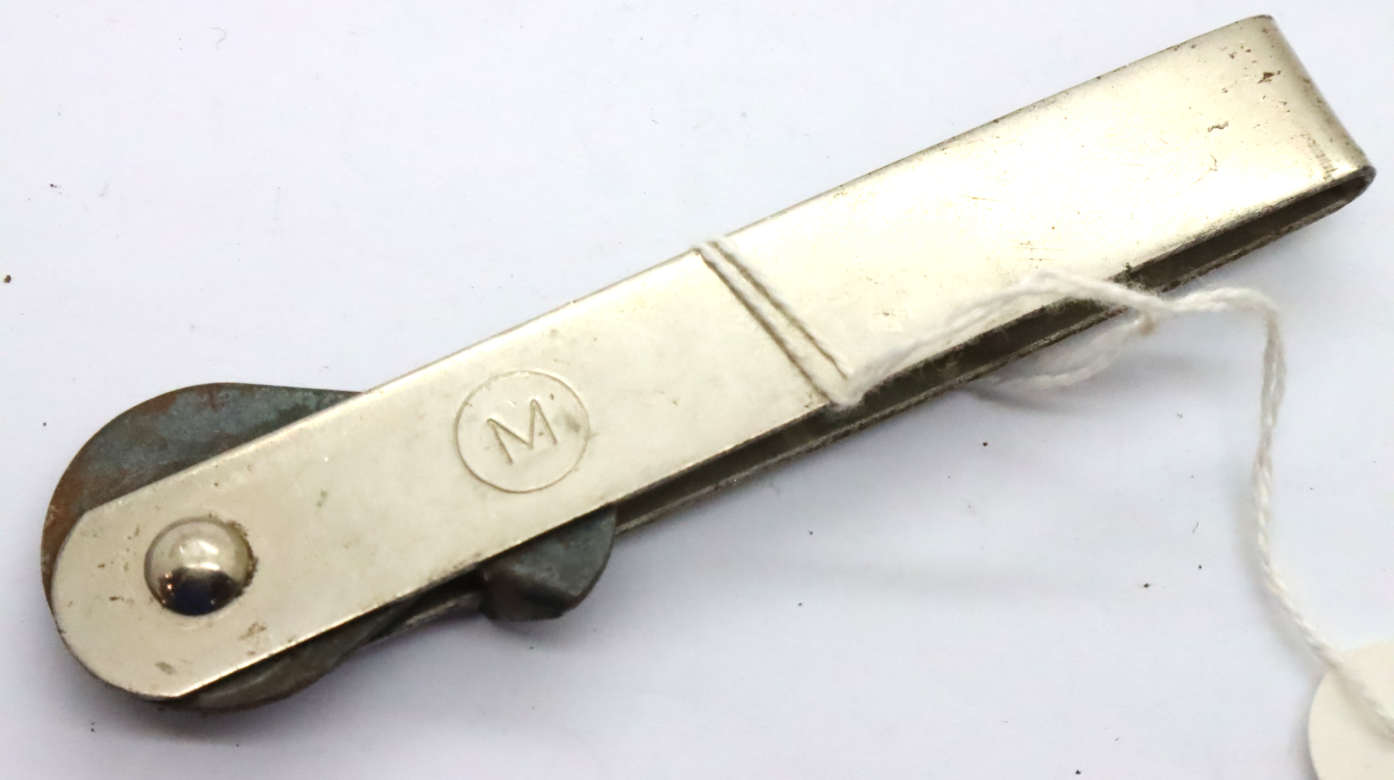 WWII Third Reich Marked Can Opener. P&P Group 1 (£14+VAT for the first lot and £1+VAT for subsequent