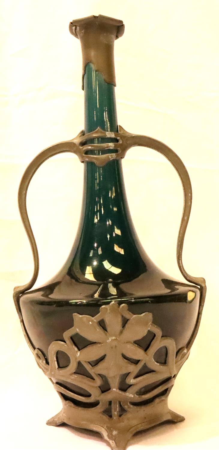 A late 19th Century turquoise ceramic bottle vase, metal mounted in the Art Nouveau manner, H: 31