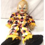 Soft fabric bodied clown with soft plastic polythene type head, H: 50 cm. P&P Group 3 (£25+VAT for