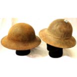 Two British WWII Zuckerman helmets, one with leather liner. P&P Group 3 (£25+VAT for the first lot