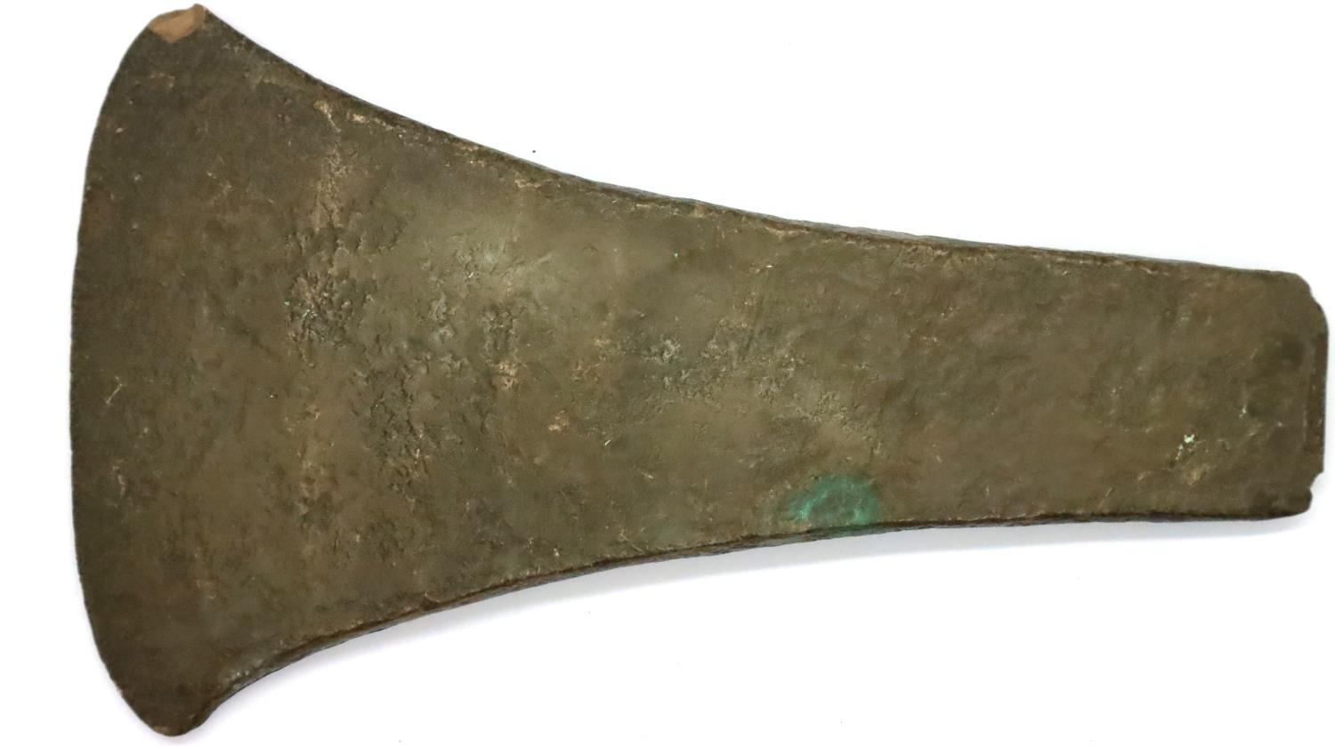 A rare bronze age axe head formed from a single piece of bronze, L: 16 cm. P&P Group 1 (£14+VAT