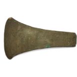 A rare bronze age axe head formed from a single piece of bronze, L: 16 cm. P&P Group 1 (£14+VAT