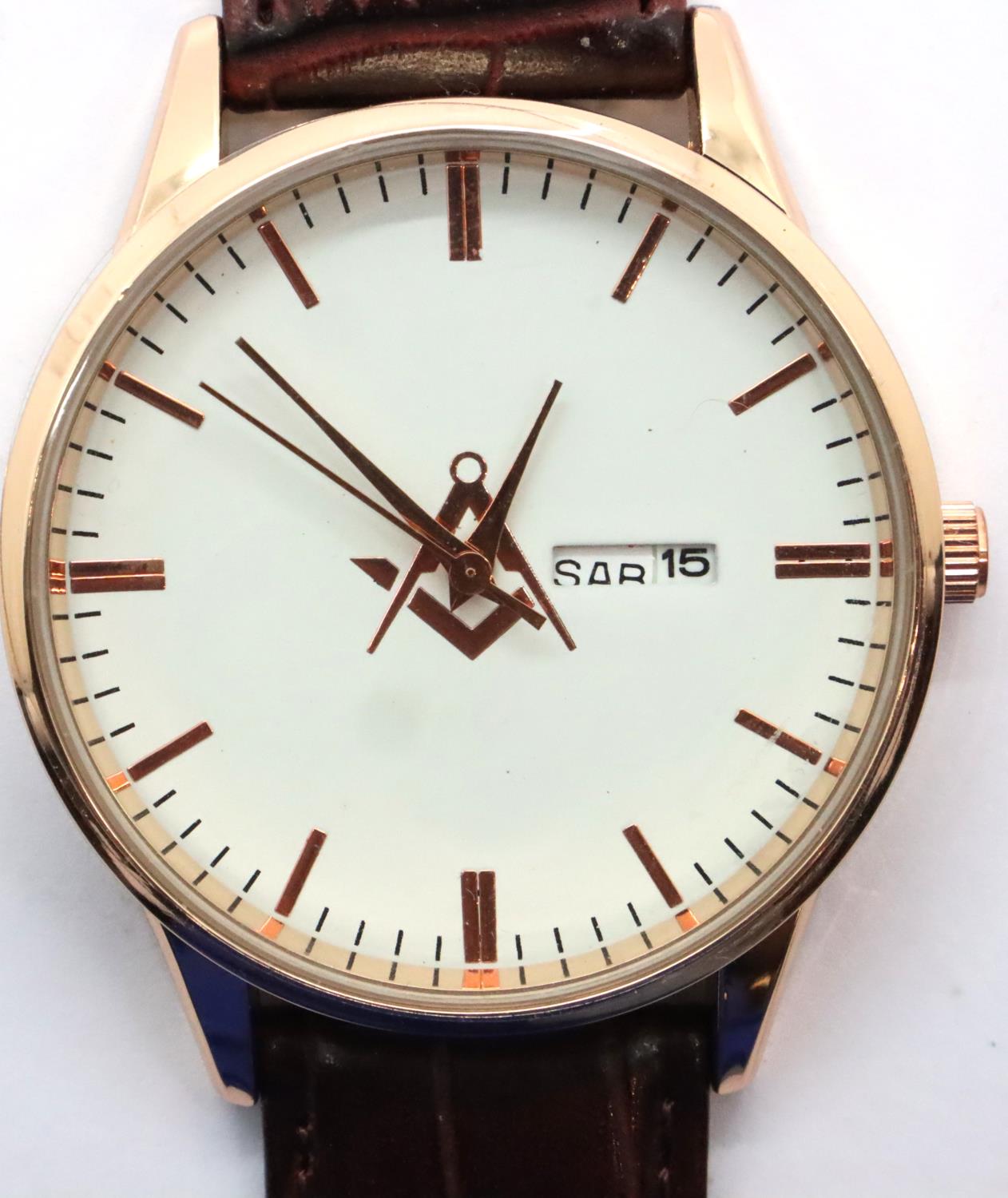 New gents wristwatch with day and date aperture (French) and Masonic emblem, working at lotting. P&P