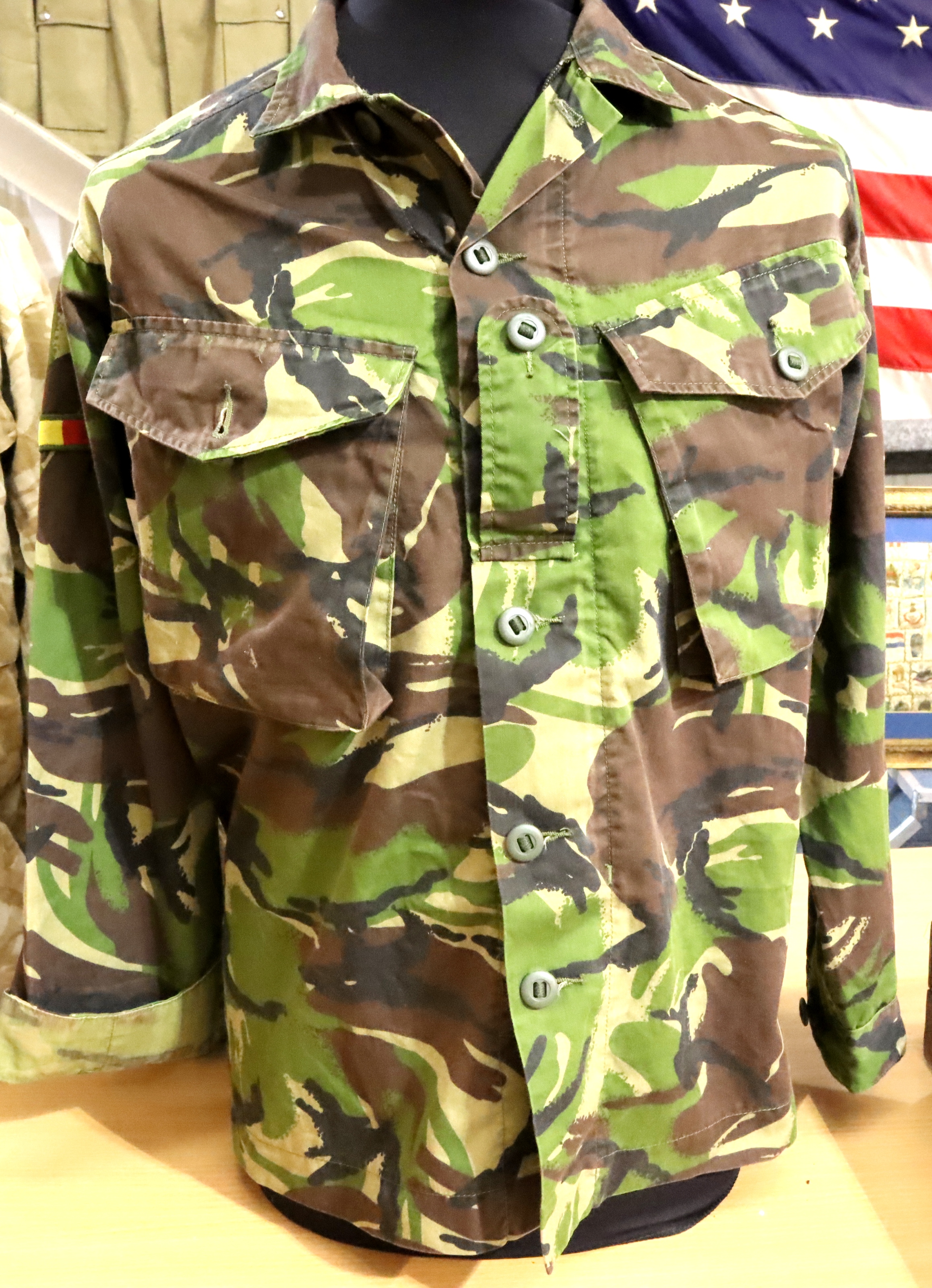 Fifty jungle camouflage DPM Grade 1 shirts. P&P Group 3 (£25+VAT for the first lot and £5+VAT for