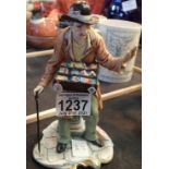 Capodimonte figure of a souvenir match seller. Not available for in-house P&P, contact Paul O'Hea at