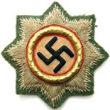 German WWII period embroidered Deutsche Cross, gold grade with green cloth back. P&P Group 2 (£18+
