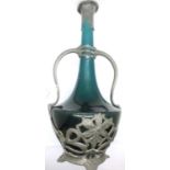 A late 19th Century turquoise ceramic bottle vase, metal mounted in the Art Nouveau manner, 2 cm