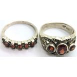Two 925 silver rings set with red stones. P&P Group 1 (£14+VAT for the first lot and £1+VAT for