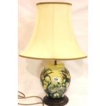 Substantial Moorcroft baluster form lamp base in the Lillies pattern, with its original supplied