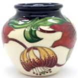 Moorcroft vase in the Anna Lily pattern, H: 8 cm. P&P Group 1 (£14+VAT for the first lot and £1+