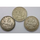 Three 1935 Rocking Horse crowns of George V. P&P Group 1 (£14+VAT for the first lot and £1+VAT for