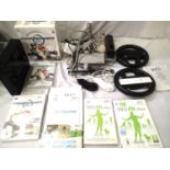 Nintendo Wii Mario Kart edition with two steering wheels, two controls, leads, instruction manuals
