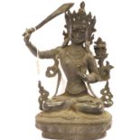 Cast iron seated Indian goddess statue, H: 33 cm. P&P Group 3 (£25+VAT for the first lot and £5+