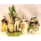 Four Staffordshire figurines including Victoria and Albert, tallest H: 27 cm. P&P Group 3 (£25+VAT