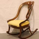 Walnut framed Victorian rocking chair with upholstered seat H: 89 cm. Not available for in-house P&