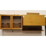 Believed Beaver and Tapley wall mounted teak units with hangers, glass fronted cupboard to measure