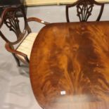 Mahogany twin pedestal dining table with drop in leaf and 6+2 chairs (one pedestal damaged), table
