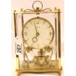 Vintage brass Kundo mechanical anniversary clock with bevelled glass panels. P&P Group 3 (£25+VAT