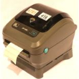 Zebra ZP-450 thermal label printer with a quantity of jewellery dumbbell labels, working at lotting,