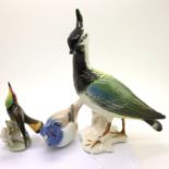 Three ceramic birds, Karl Ens (chip to beak) Hutschenreuther and Copenhagen, tallest H: 19 cm. P&P