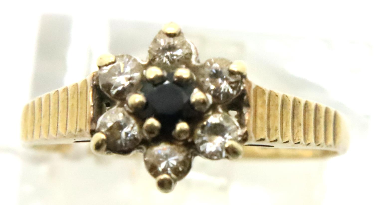 9ct gold stone set cluster ring, size I, 1.3g. P&P Group 1 (£14+VAT for the first lot and £1+VAT for