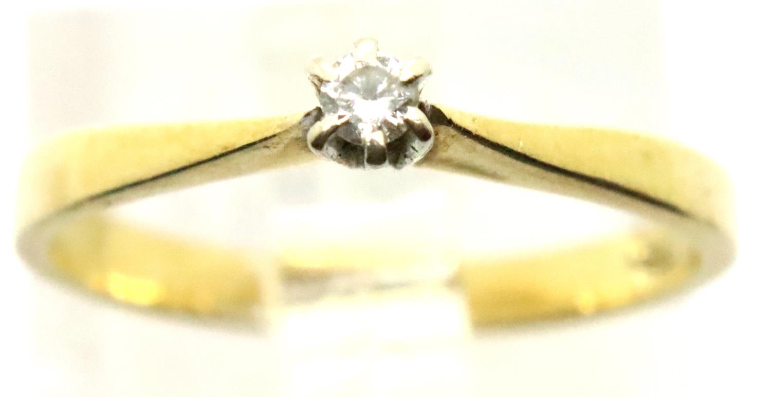 14ct diamond set solitaire ring, size K, 1.6g. P&P Group 1 (£14+VAT for the first lot and £1+VAT for