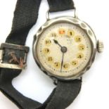 WWI type silver wristwatch with red 12 dial, not working at lotting. P&P Group 1 (£14+VAT for the