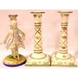 Pair of Continental candlesticks, H: 24 cm and a further figurine. Some crazing to candlesticks