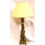 Large brass table lamp with decorative putti, H: 60 cm. Not available for in-house P&P, contact Paul