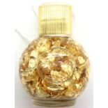 Small bottle of loose gold leaf. P&P Group 1 (£14+VAT for the first lot and £1+VAT for subsequent