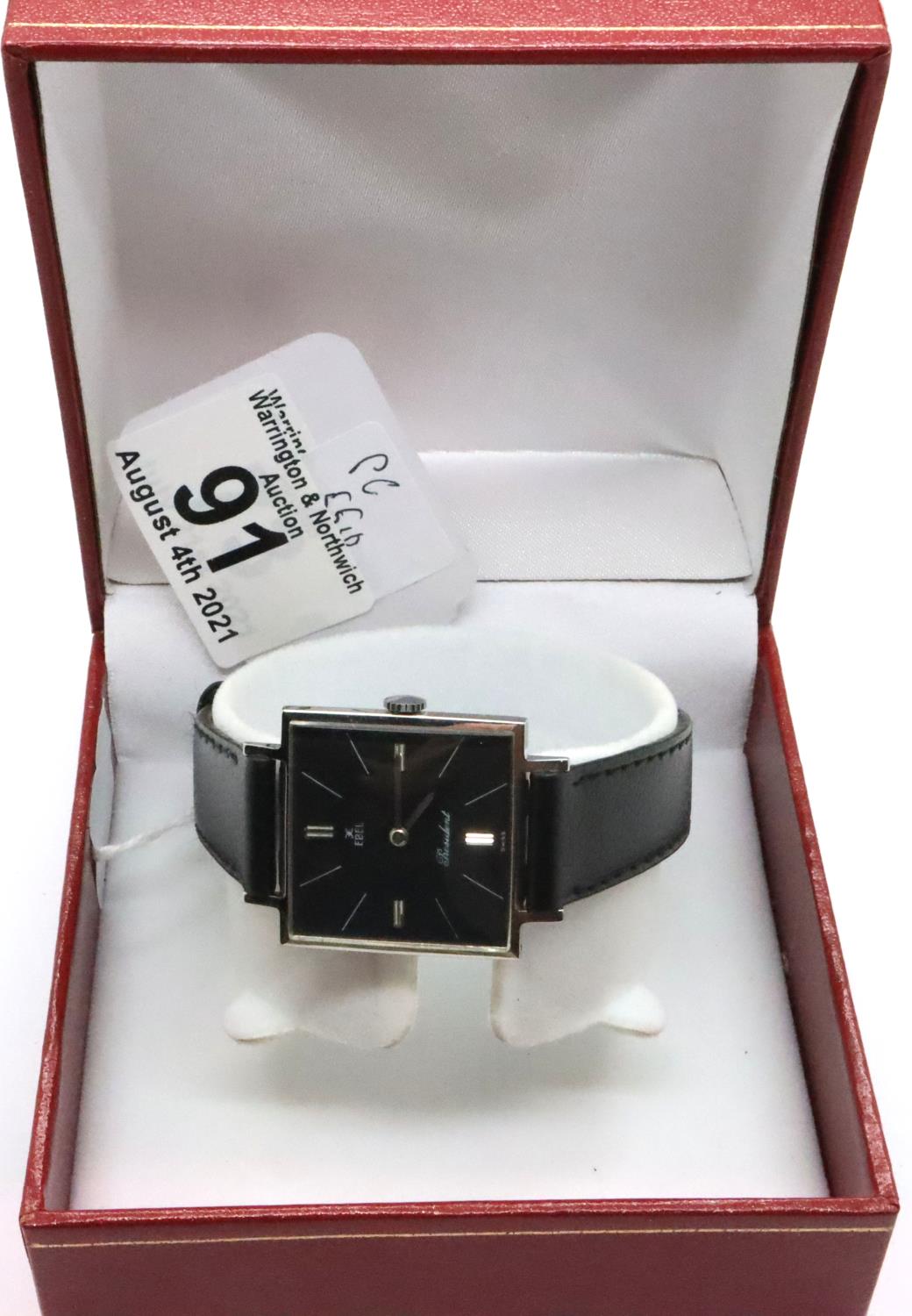 Ebel; vintage ultra slim gents wristwatch, President model with square black dial, silver hands