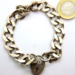 Hallmarked silver curb link bracelet with padlock clasp, 44g. P&P Group 1 (£14+VAT for the first lot