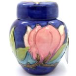 Moorcroft ginger jar in the Magnolia pattern. H: 11 cm. P&P Group 2 (£18+VAT for the first lot