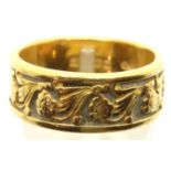 22ct gold band ring, floral designed in relief, Birmingham 1963, size P, 8.4g. Some minor surface