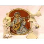 Metzler & Orloff dancing girl, Continental figurine and a Mettlack plate, H: 19 cm. No cracks, chips