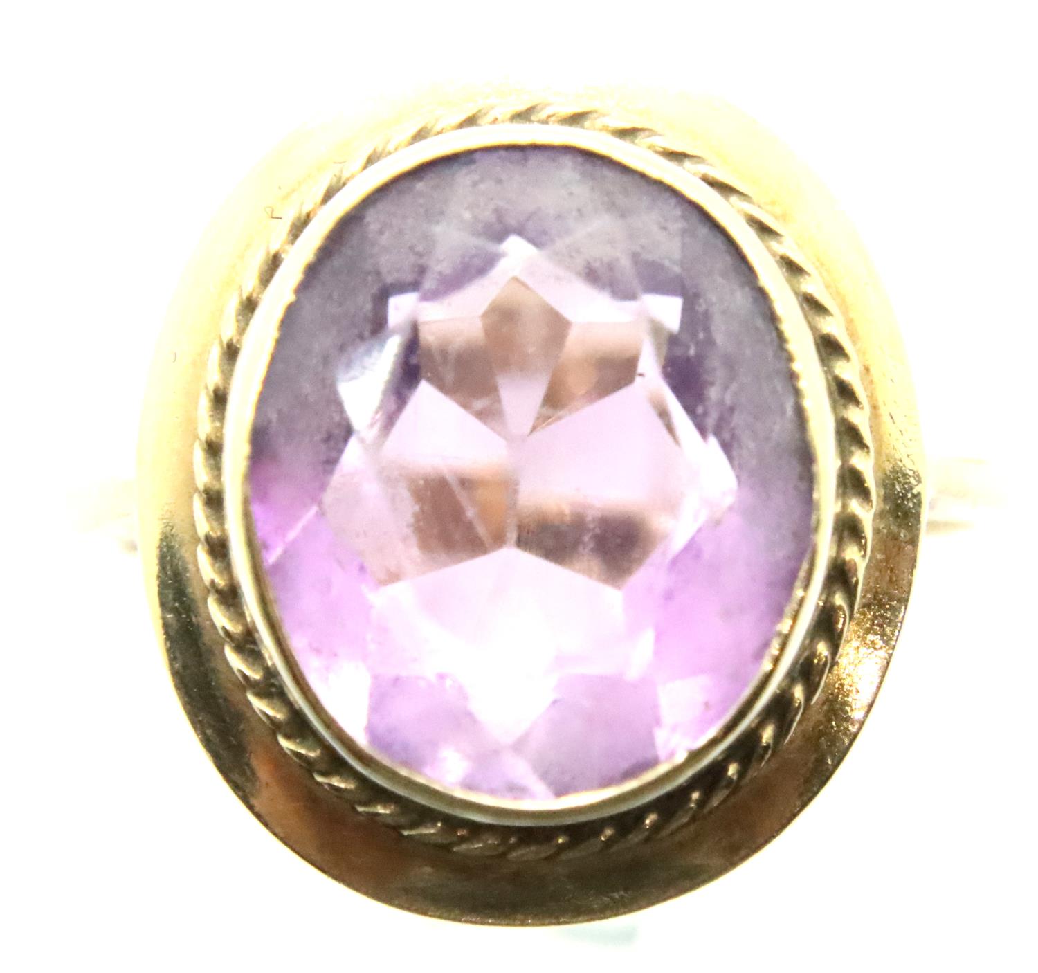 9ct gold amethyst set dress ring, size K/L, 4.0g. P&P Group 1 (£14+VAT for the first lot and £1+