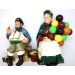 Two Royal Doulton figurines Tail story (HN2243) and the old balloon seller (HN1315). P&P Group 2 (£