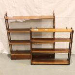 An Edwardian mahogany wall-mounting open bookcase with fretted supports and two drawers, 82 x 17 x