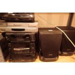 Panasonic midi system with 3CD changer, turntable and a video recorder. Not available for in-house