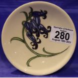 Moorcroft coaster in the Bluebell Harmony pattern, D: 13 cm. P&P Group 1 (£14+VAT for the first