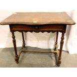 A Victorian mahogany single drawer side table with shaped top and turned supports, 94 x 67 x 76 cm