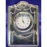 Boxed Carrs hallmarked silver cased clock. P&P Group 2 (£18+VAT for the first lot and £3+VAT for
