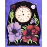 Moorcroft mantel clock, H: 21 cm. No cracks, chips or visible restoration. P&P Group 3 (£25+VAT