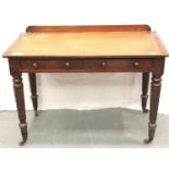 A Victorian walnut two-drawer writing table, for restoration, 107 x 55 x 78 cm H. Not available