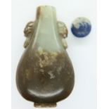 18th century Chinese carved jade snuff bottle, having a lapis lazuli cover (no dropper), H: 63mm.